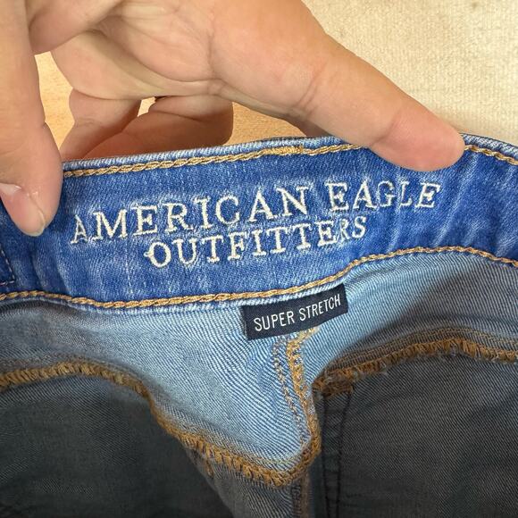 American Eagle Outfitters Medium Wash Super Stretch Cut Off Shorts Size 0 - Picture 3 of 4